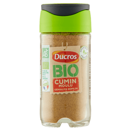 Foto van Ducros Komijn gemalen op witte achtergrond