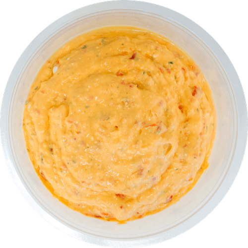 Foto van DekaMarkt Roomkaas zoete peper op witte achtergrond