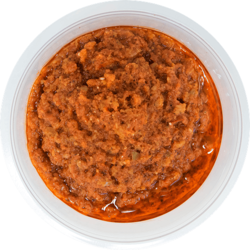 Foto van DekaMarkt Tapenade tomaat op witte achtergrond