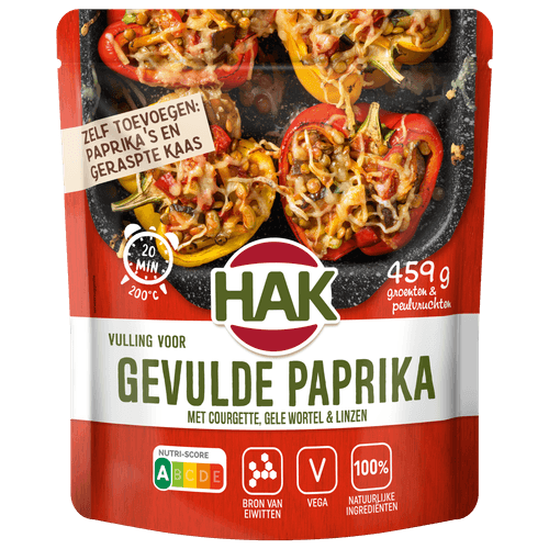 Foto van Hak Uit de oven gevulde paprika op witte achtergrond