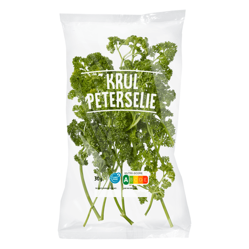 Foto van Peterselie krul op witte achtergrond