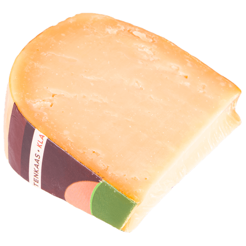 Foto van DekaVers Klaver sikkepit geitenkaas oud stuk op witte achtergrond