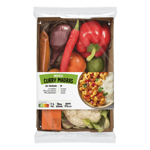 Foto van Verspakket Indiase curry madras op witte achtergrond
