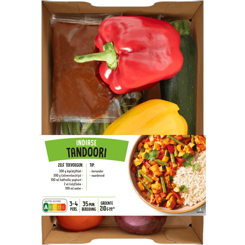 Foto van Verspakket indiase tandoori op witte achtergrond