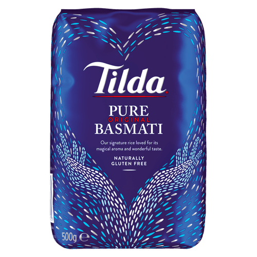 Foto van Tilda Rijst basmati pure op witte achtergrond