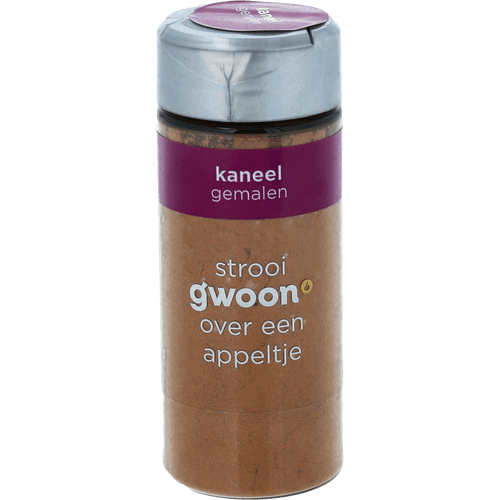 Foto van G'woon Kaneel gemalen op witte achtergrond