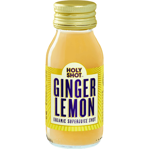 Foto van Holyshot Gembershot met citroen op witte achtergrond