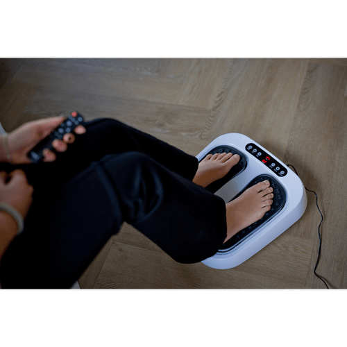 Foto van NEXXT Voetmassage met shiatshu op witte achtergrond