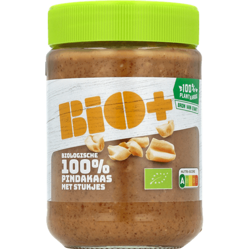 Foto van Bio+ 100% pindakaas met stukjes op witte achtergrond