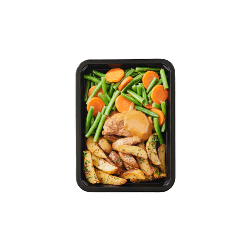 Foto van Exclusief varkenshaas schotel op witte achtergrond