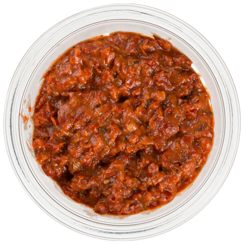 Foto van DekaVers Tapenade basilicum op witte achtergrond