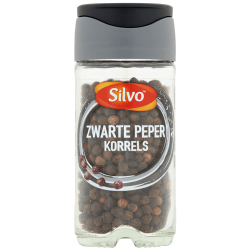 Foto van Silvo Peper zwart hele korrels op witte achtergrond