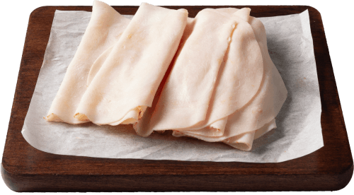 Foto van DekaVers Kipfilet flinterdun op witte achtergrond