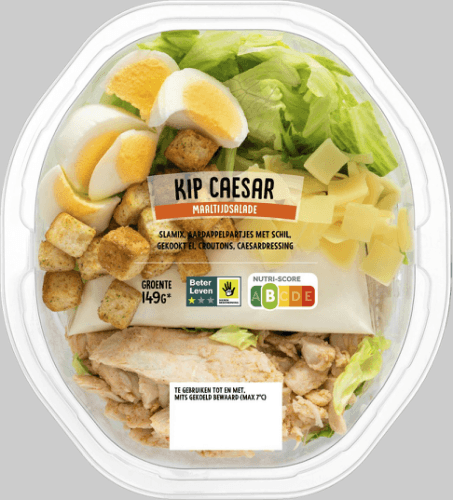 Foto van Maaltijdsalade kip caesar op witte achtergrond
