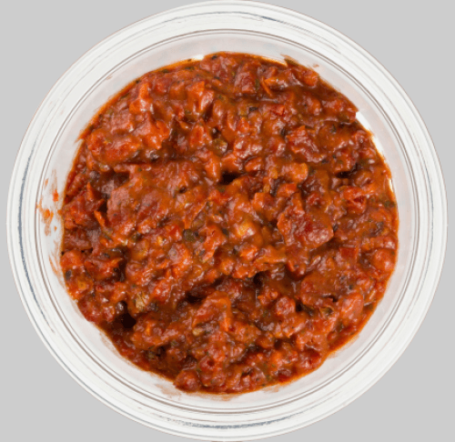 Foto van DekaVers Tapenade basilicum op witte achtergrond