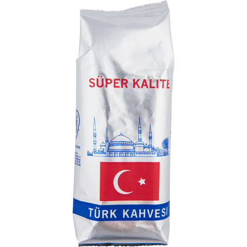 Foto van Kahves GemalenTurkse koffie op witte achtergrond